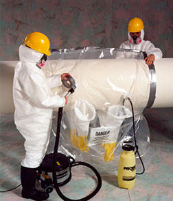 worker using 6684-2 asbestos glove bag 