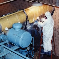 workers using asbestos glove bag