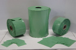 rolls and pouches of nuclear green polyethylene