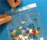 lip and tape bag filled with paper stars