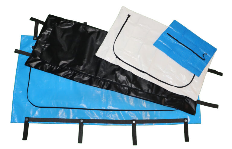 four body bags in a range of sizes from infant to bariatric